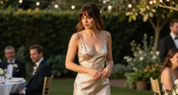 Dakota Johnson Gives Her Signature Style the Wedding-Guest Treatment With a Sheer Black Halter Dress